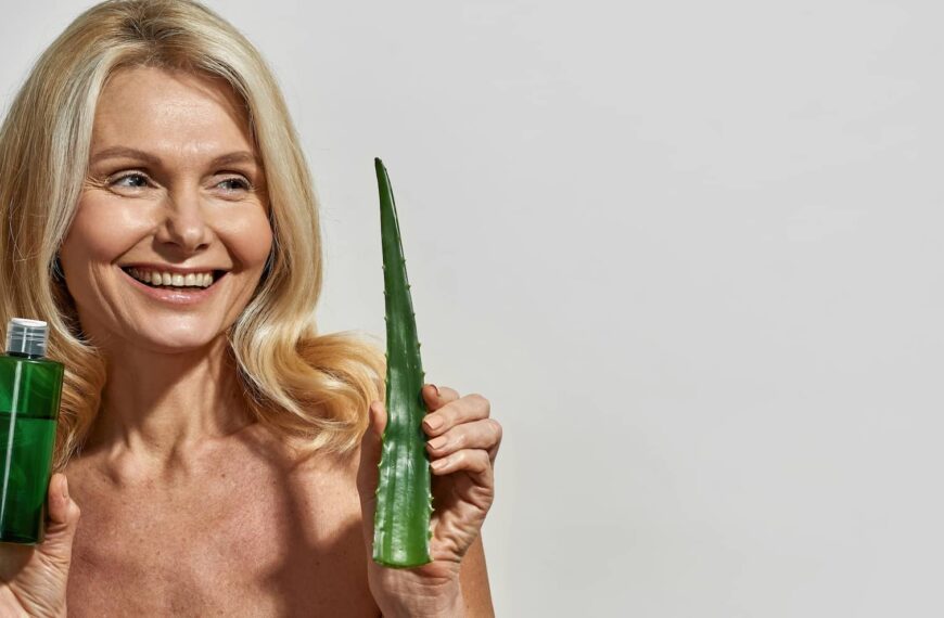 woman hold aloe vera leaf and lotion