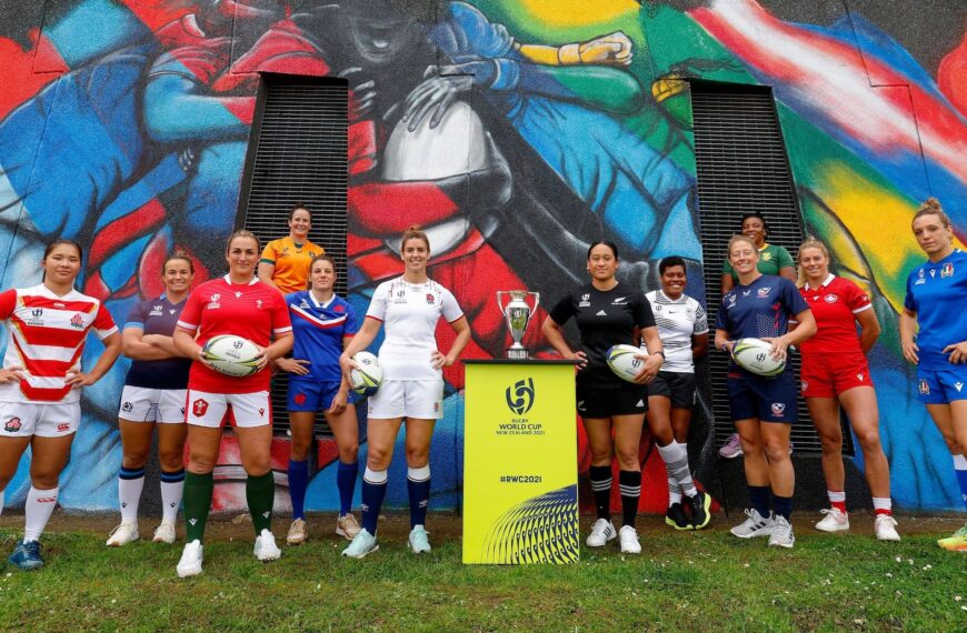 (L-R) Rachel Malcolm (Scotland), Saki Minami (Japan), Siwan Lillicrap (Wales), Shannon Perry (Australia), Gaelle Hermet (France), Sarah Hunter (England), Kennedy Simon (New Zealand), Sereima Leweniqila (Fiji), Kate Zackary (USA), Nolusindiso Booi (South Africa), Sophie de Goede (Canada) and Elisa Giordano (Italy) pose in front of a mural specially created for the tournament during the Rugby World Cup 2021 Captains' Photocall at Eden Park on 2 October, 2022 in Auckland, New Zealand. (Photo by Hagen Hopkins - World Rugby/World Rugby
