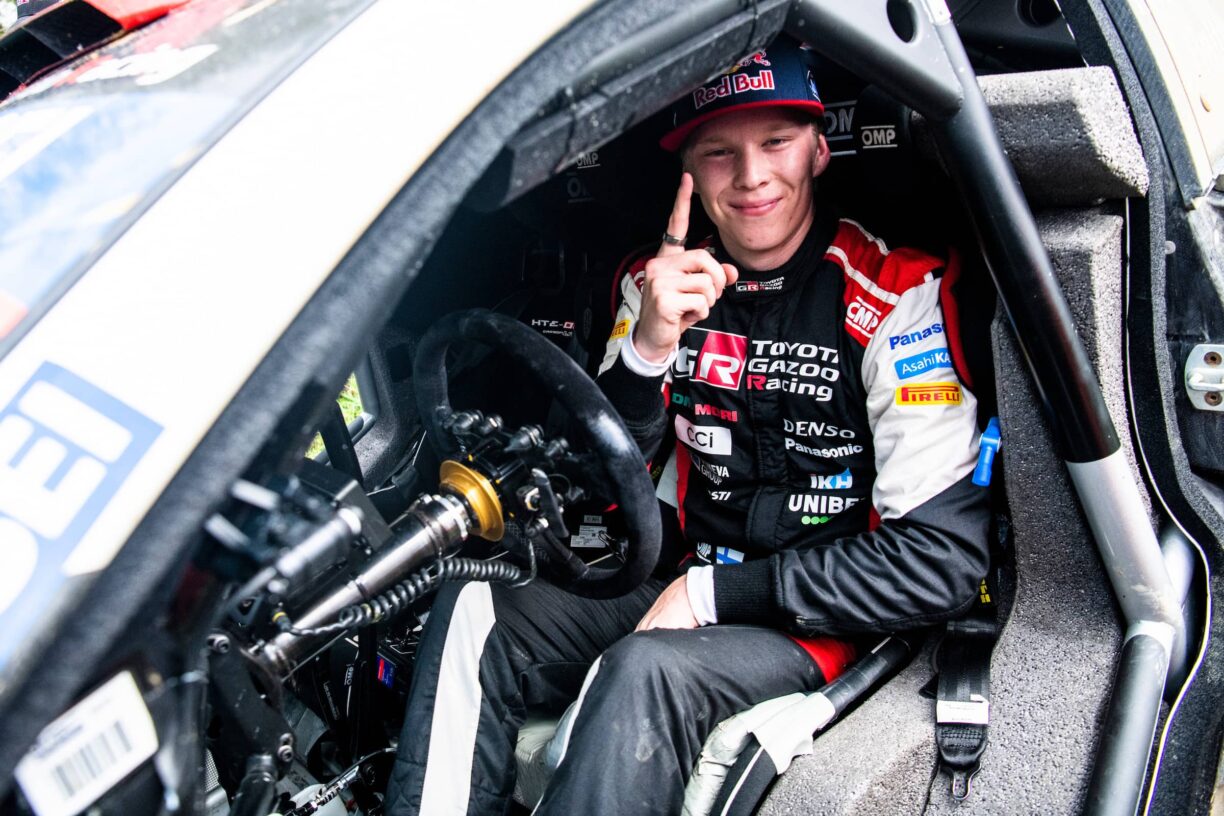 Kalle Rovanpera (FIN) of team Toyota Gazoo Racing celebrates on the podium after winning their maiden FIA World Rally Championship title in Auckland