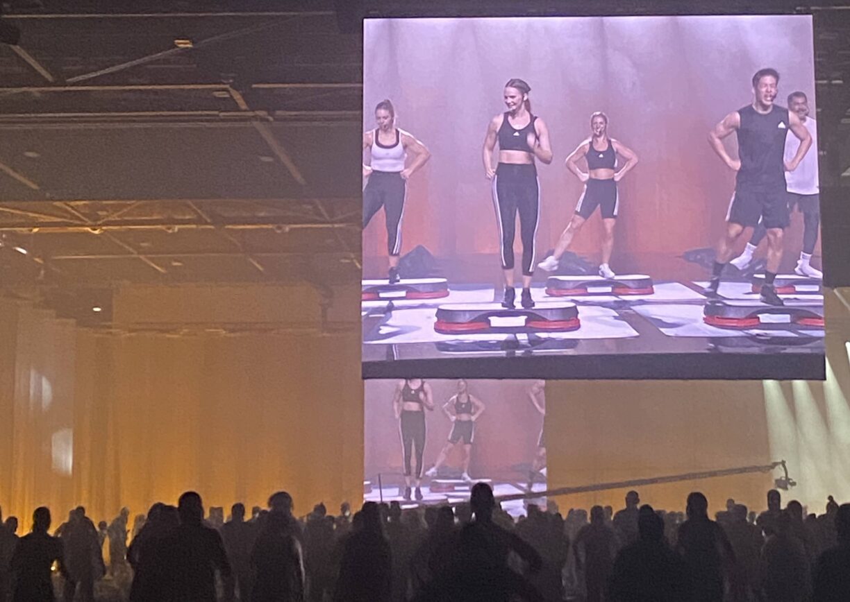 Les mills trainers on stage at excel london