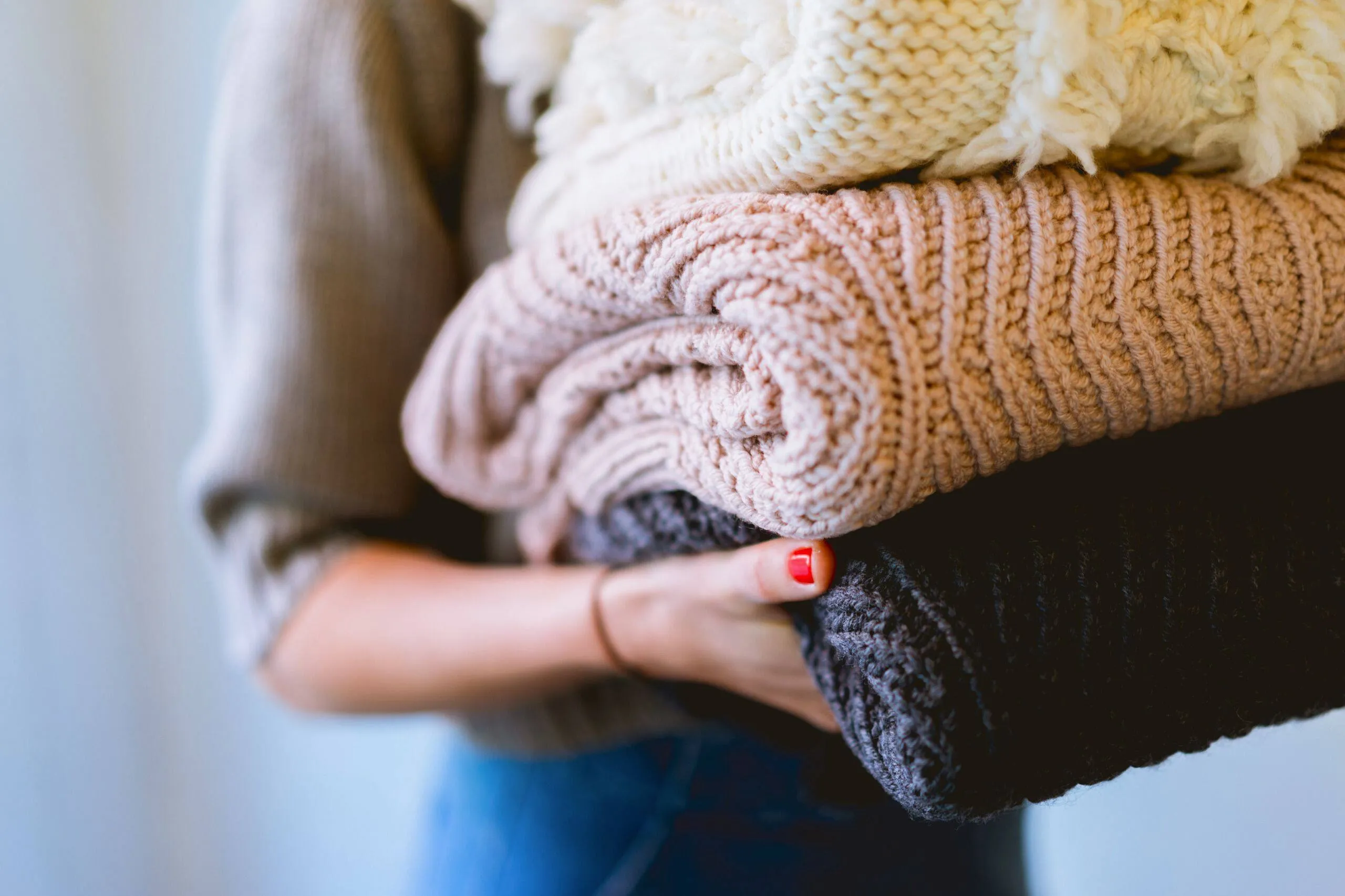 person holding laundry