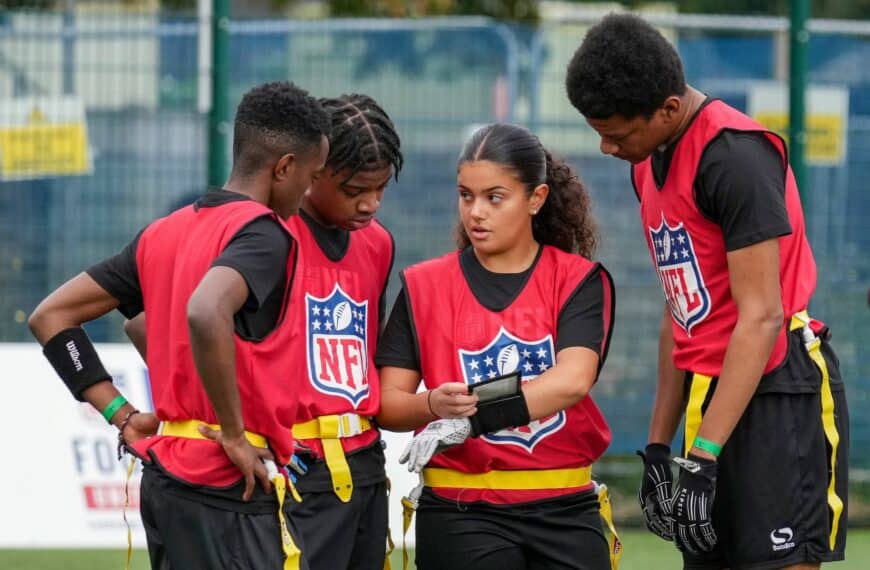 young people wearing nfl bibs