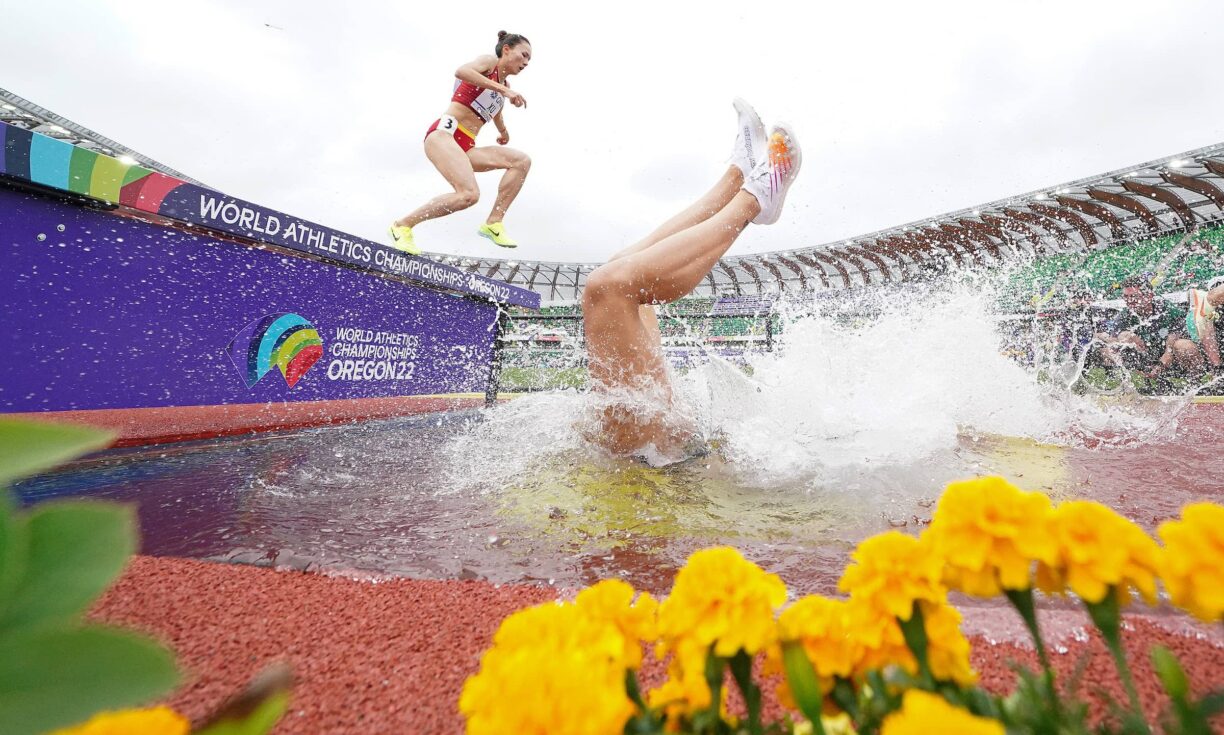 Germany's lea meyer falls headfirst into the water while competing in the women's 3000m steeplechase