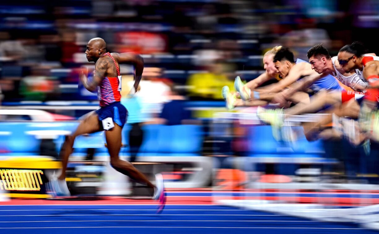 Grant holloway of usa strides away from the chasing pack while competing in the men's 60m hurdles semifinals