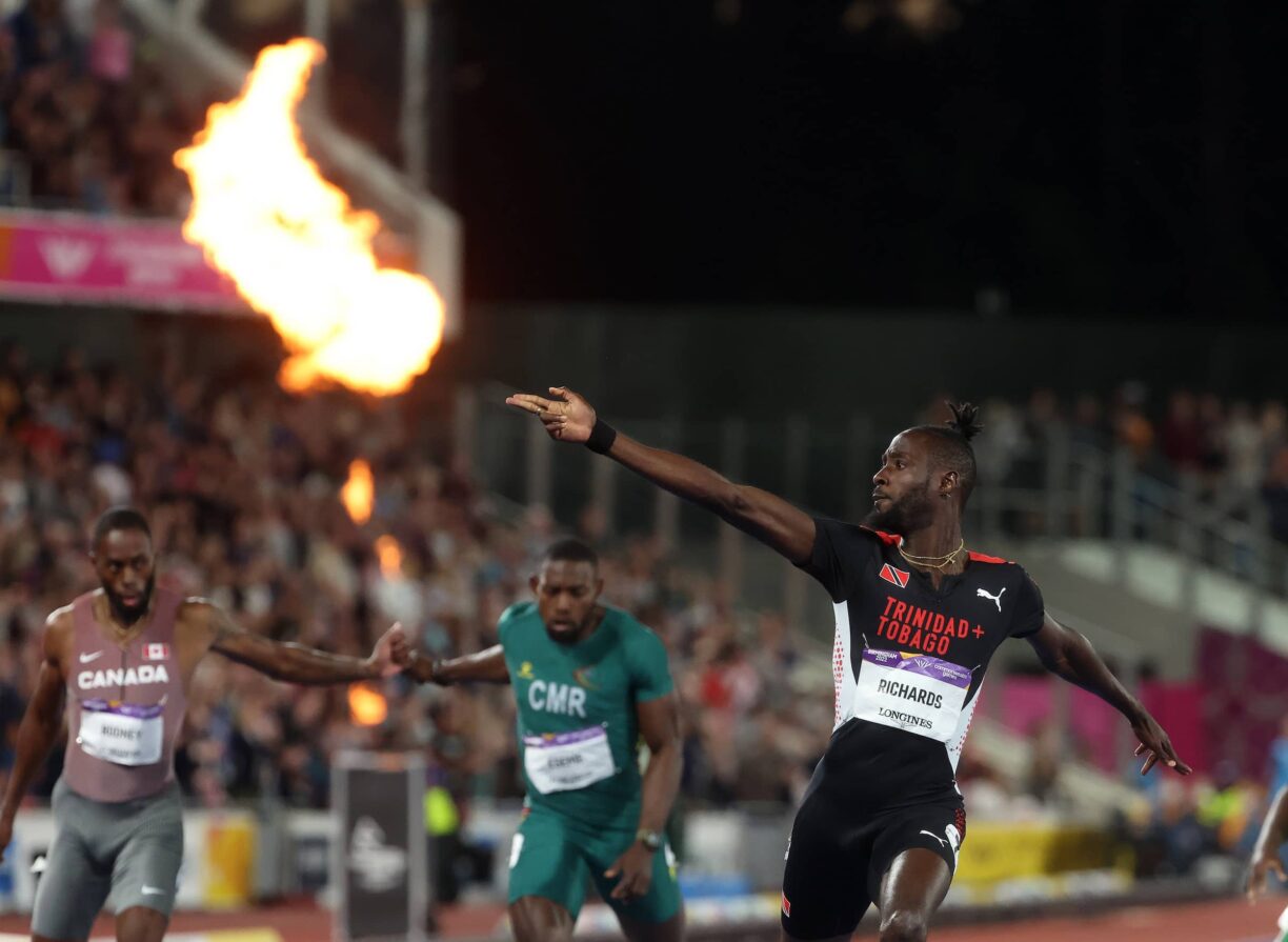 Jereem richards of trinidad and tobago celebrates after winning gold in the final of the men's 200m at the commonwealth games