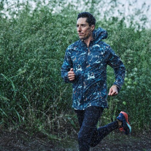 Runner wearing men's ua storm outrun the cold jacket