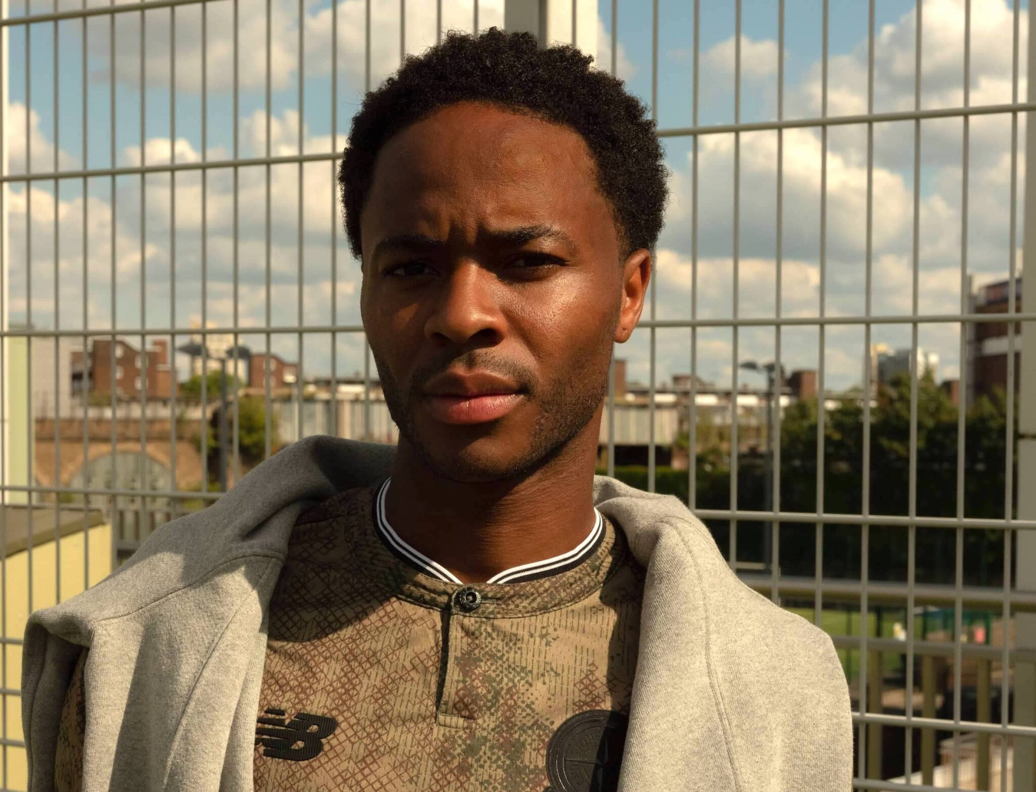 Raheem stirling reps the stone island and new balance collection