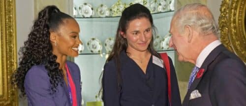 Britain's King Charles III meets Olympic medallists, from left, Frazer Clarke, Imani Lansiquot and Sarah Storey at Buckingham Palace, in London, Wednesday Nov. 2, 2022 during a reception for over 200 medalists from the Tokyo 2020 Olympic and Paralympic Games and the Beijing 2022 Winter Olympic and Paralympic Games.