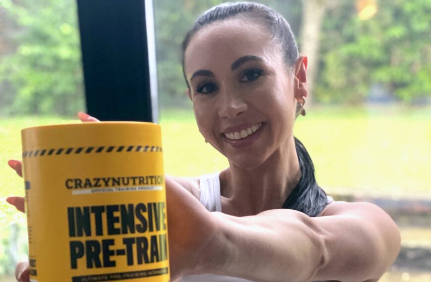 fit woman holds crazy nutrition supplement