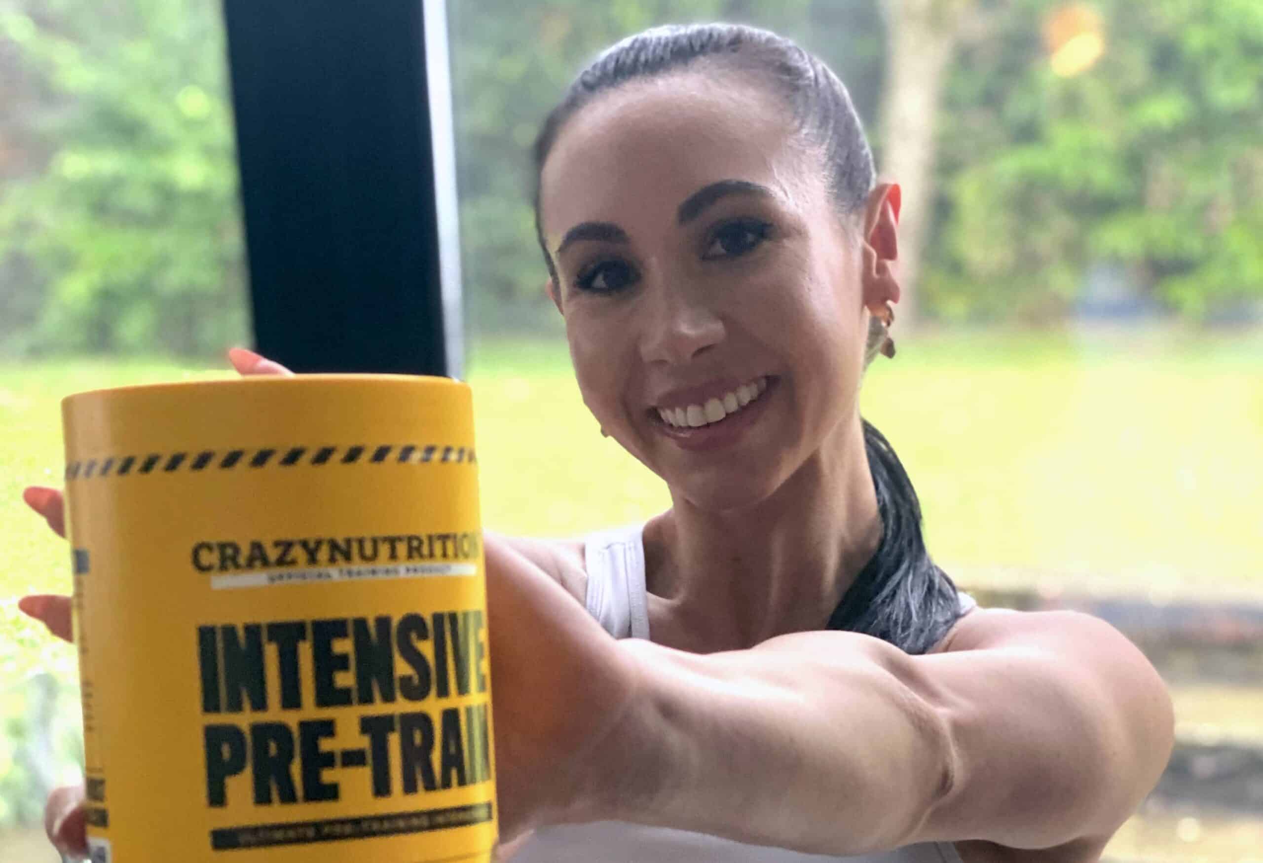 Fit woman holds crazy nutrition supplement