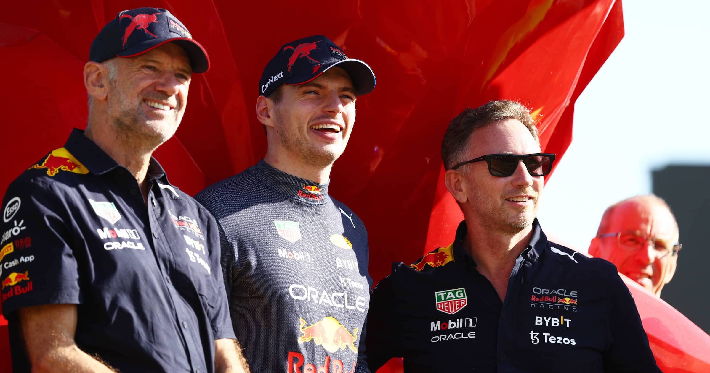 Max Verstappen and Red Bull Racing celebrates with Red Bull Racing Christian Horner, Adrian Newey, and his team