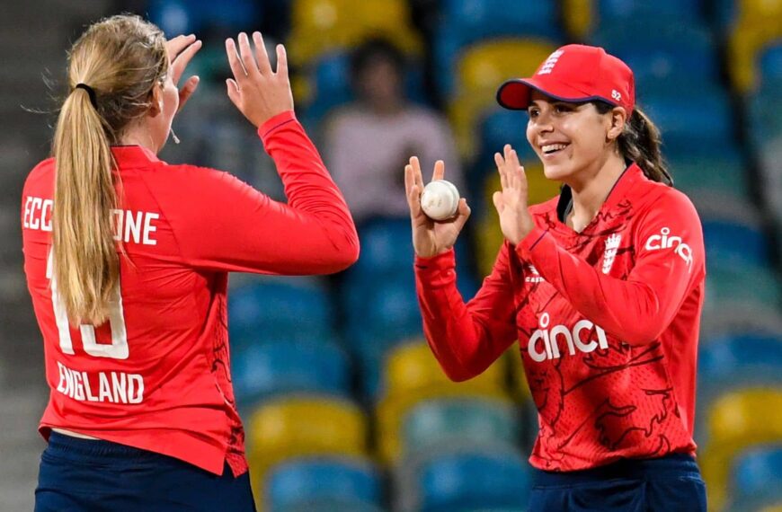 Sophie Ecclestone and Maia Bouchier celebrating at the Kensington Oval, Barbados.