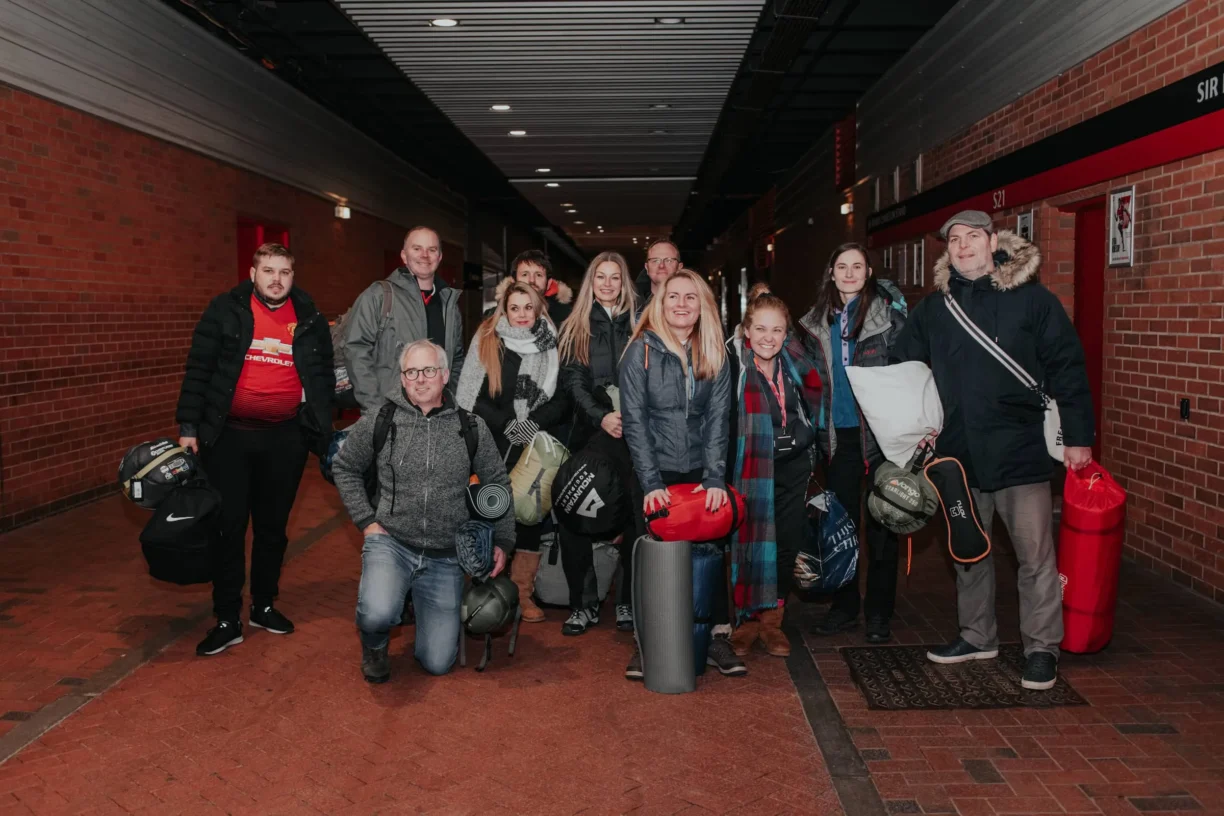 Supporters arrive with their sleeping bags