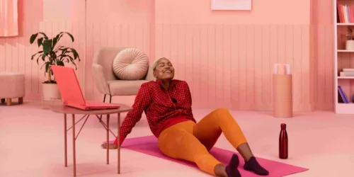 Gympass athlete on yoga mat