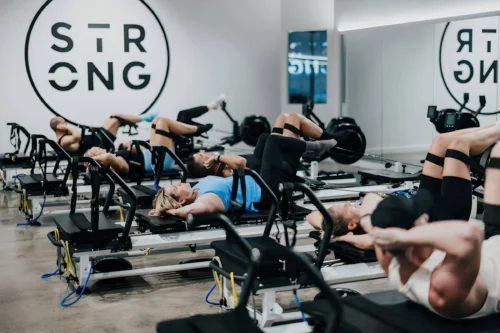 people performing Strong Pilates