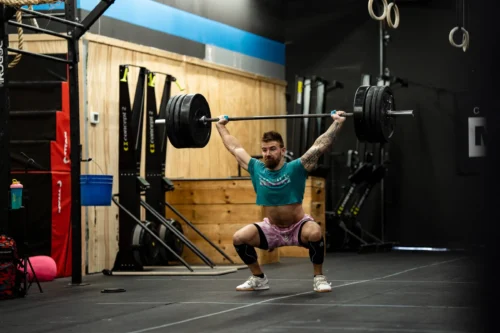 CrossFits Nick Mathew squats with barbell