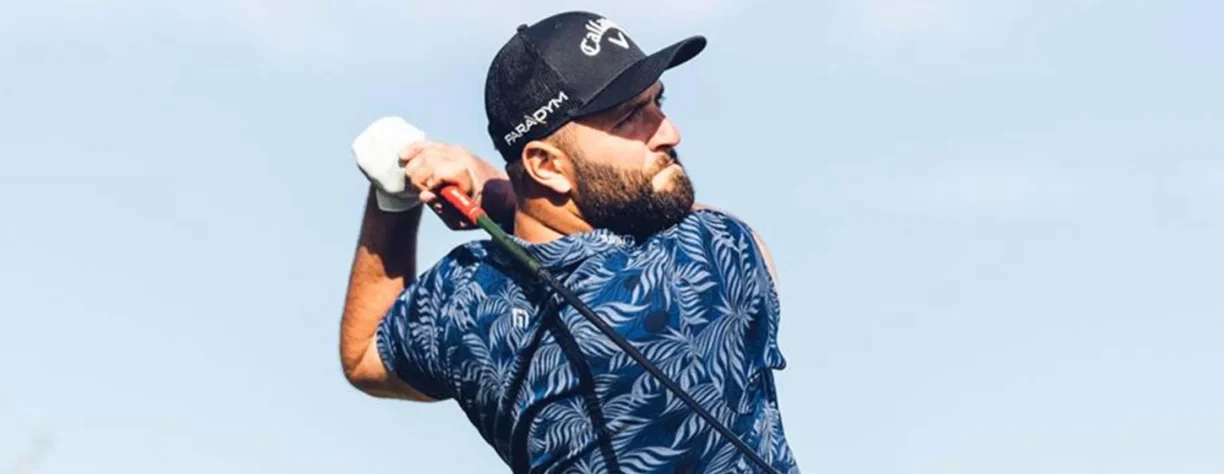 Jon Rahm hits golf ball