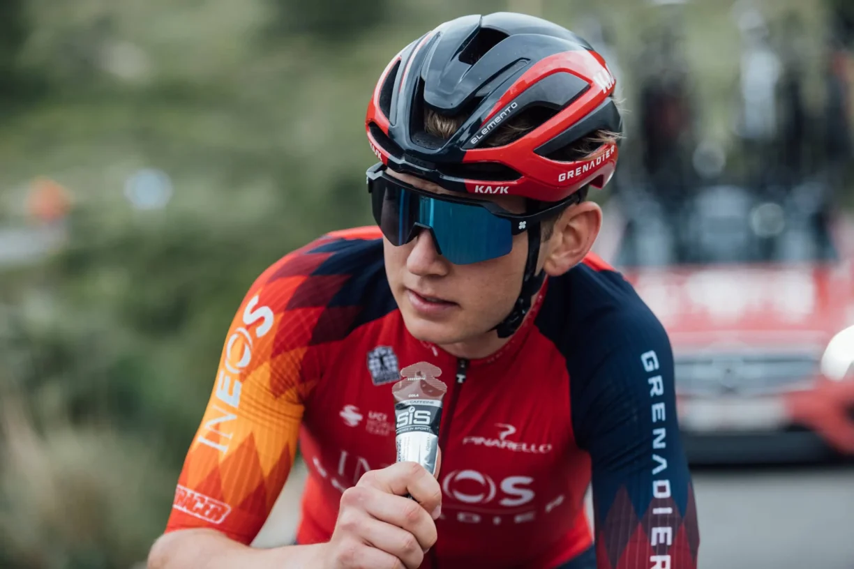 cyclist holding SIS drink