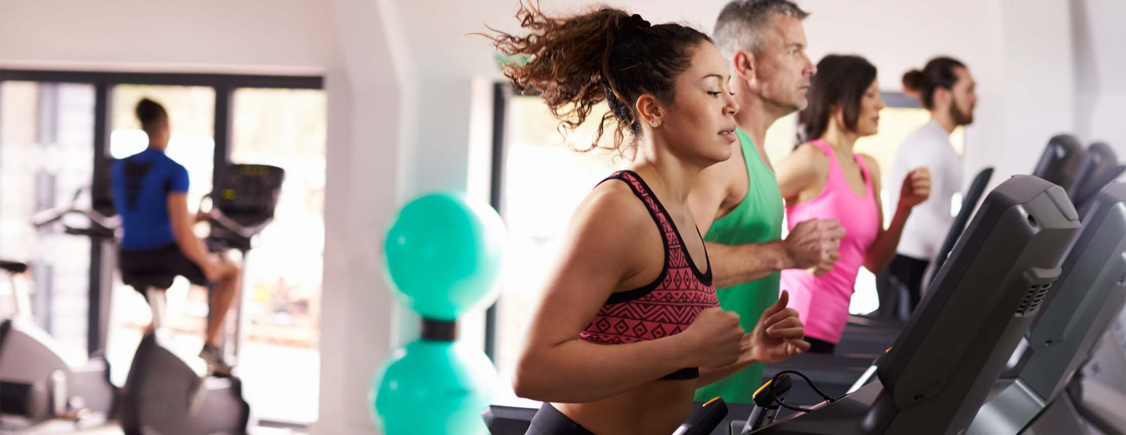 Gym goers on treadmill