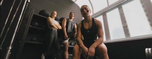 les mills instructors look directly at the camera