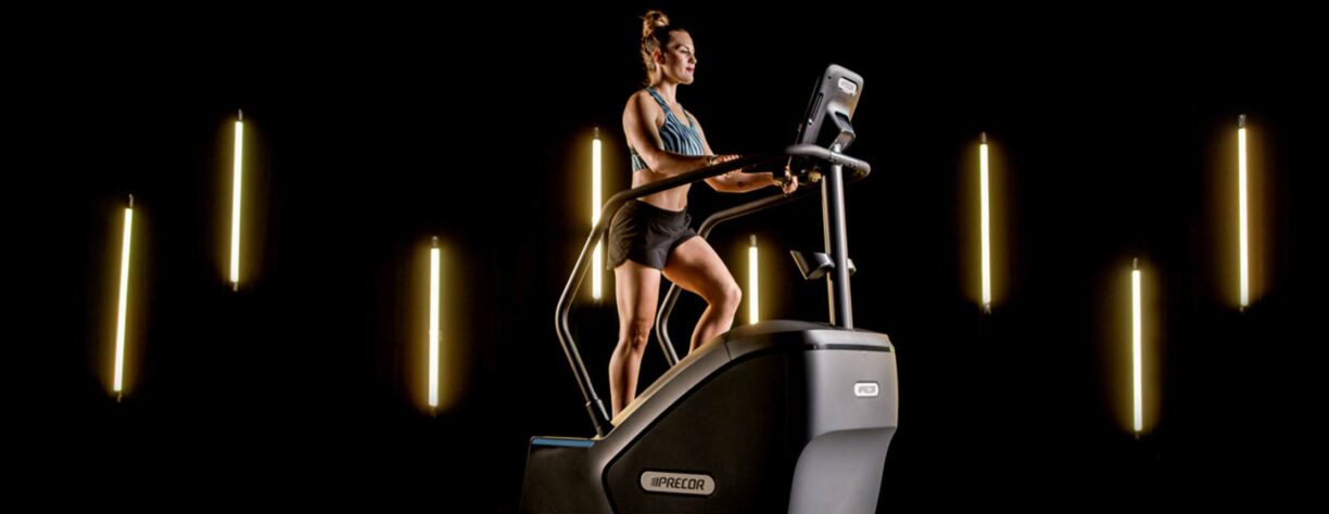 fitness goer using precor stairclimber