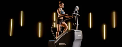 fitness goer using precor stairclimber