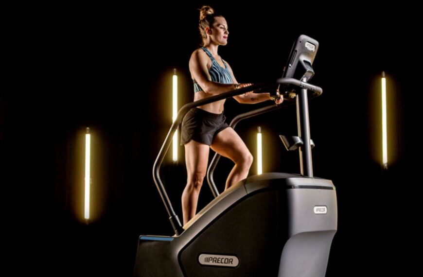 fitness goer using precor stairclimber