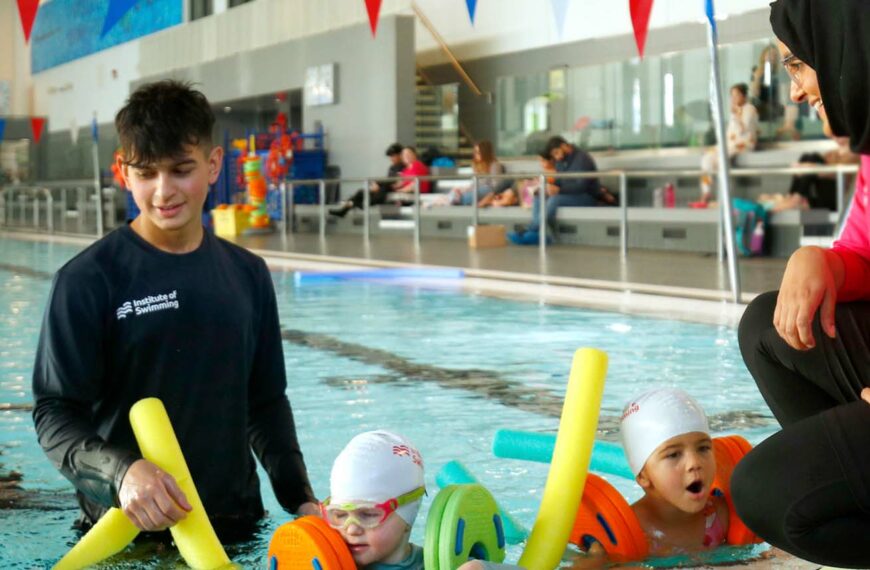 youngsters being taught to swim