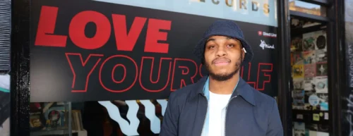 Rapper Marc Jones outside record label