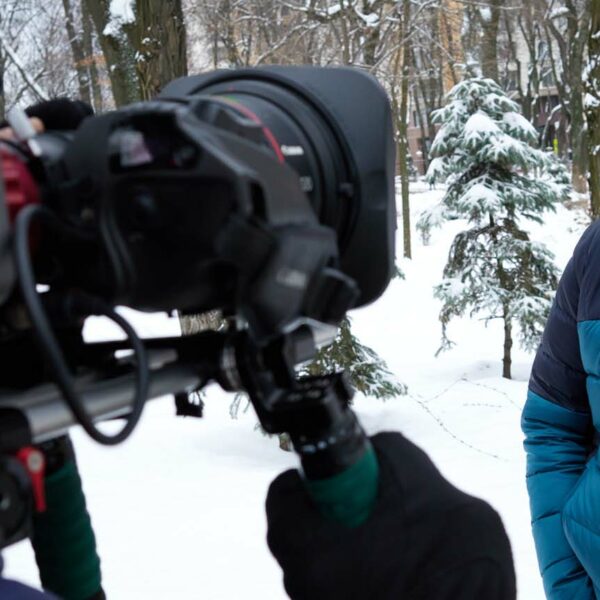 bear grylls talks to camera crew