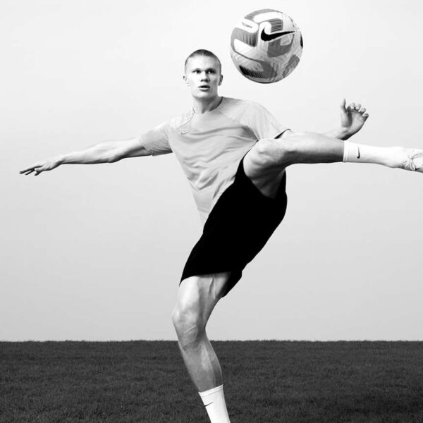 erling haaland kicks a football