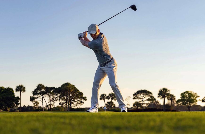 golfer wearing Garmin's Approach S70 series