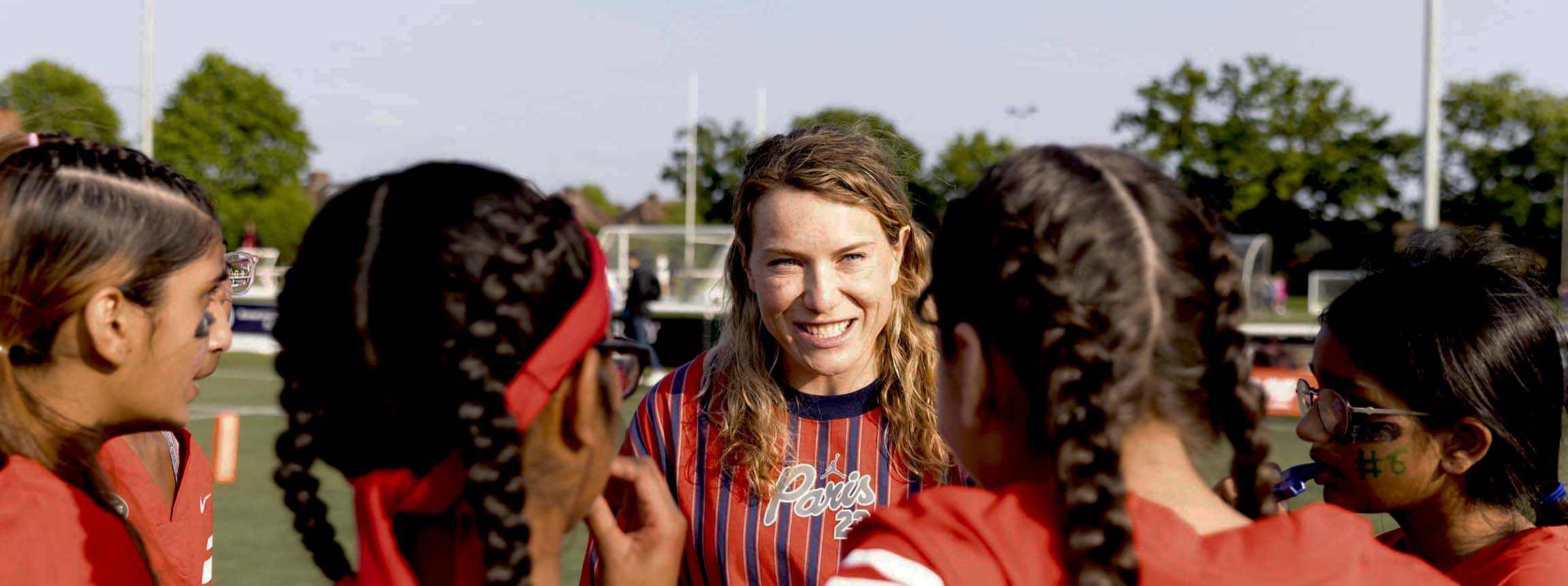 Phoebe schecter speaks to young female american footballers in the uk