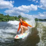 young person wakesurfing