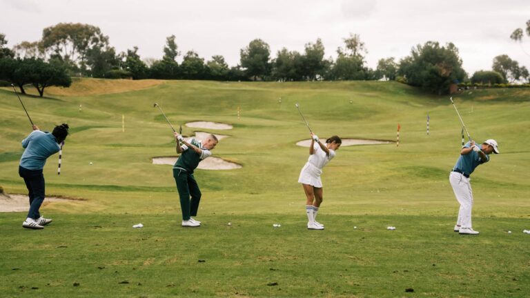 macklemore and golfers on the driving range