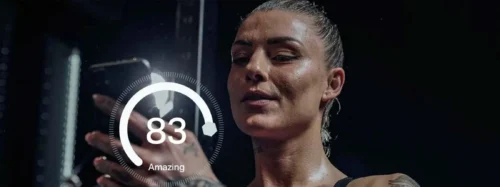 fit looking person checking their phone