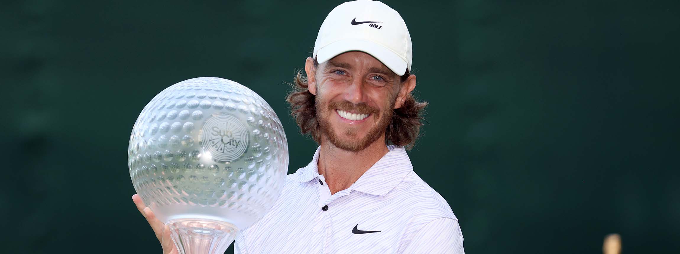 Tommy fleetwood with sun city trophy