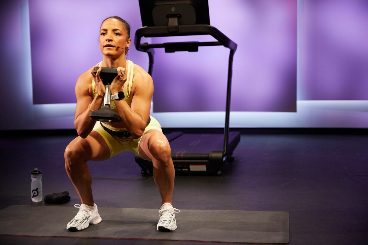 Joslyn Thompson-Rule performing a weighted squat