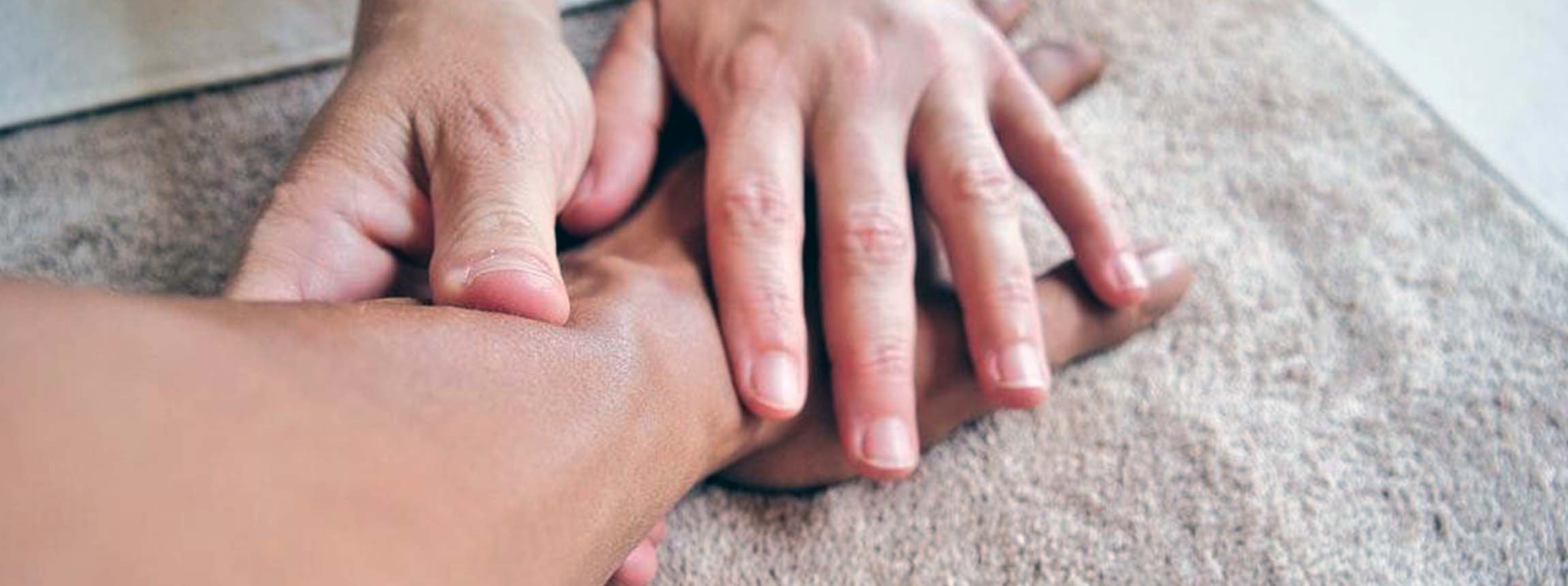 Hand being massaged
