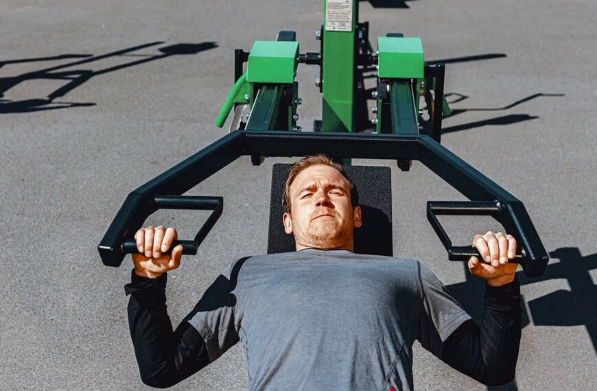 man works out in public park