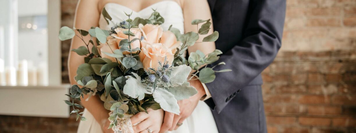 wedding couple embrace