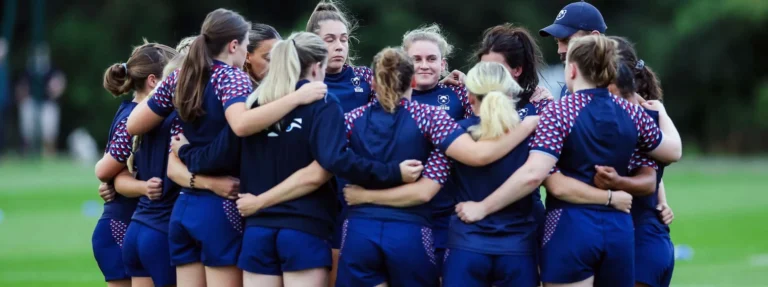 Bristol Sports Team in group huddle