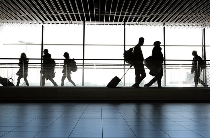 People walking through airport