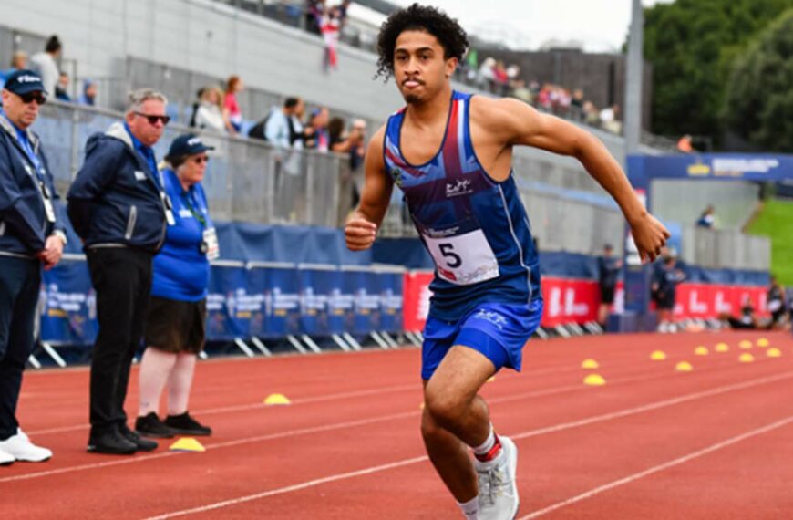 athlete races to the end of track