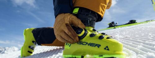Skiier adjusts Fischer Ski Boot