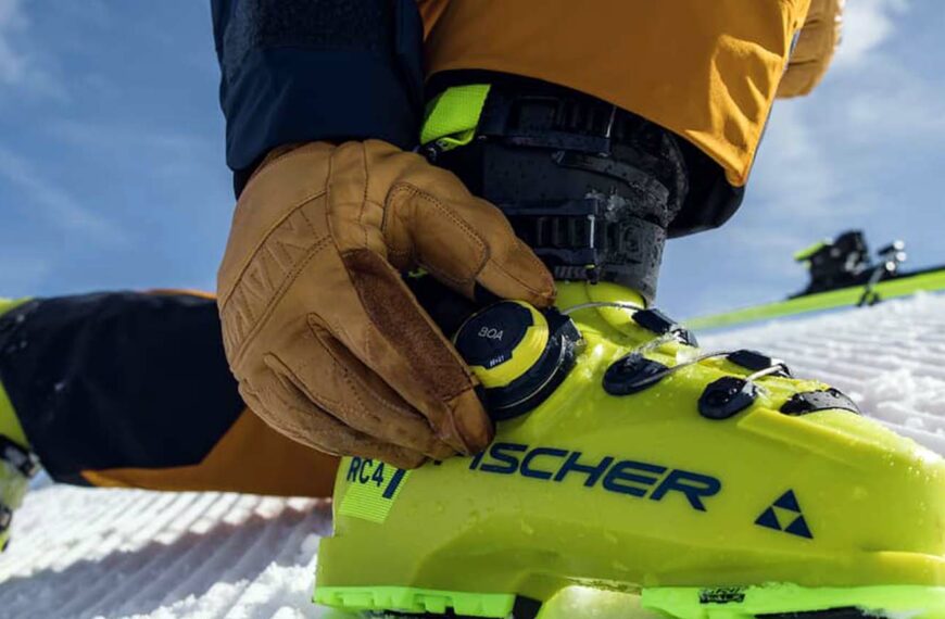 Skiier adjusts Fischer Ski Boot