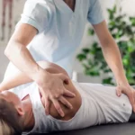 rehabilitation physiotherapy worker with woman client