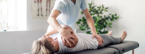 rehabilitation physiotherapy worker with woman client