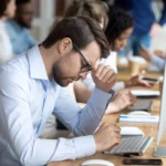Businessman feels desperate having serious problem at work