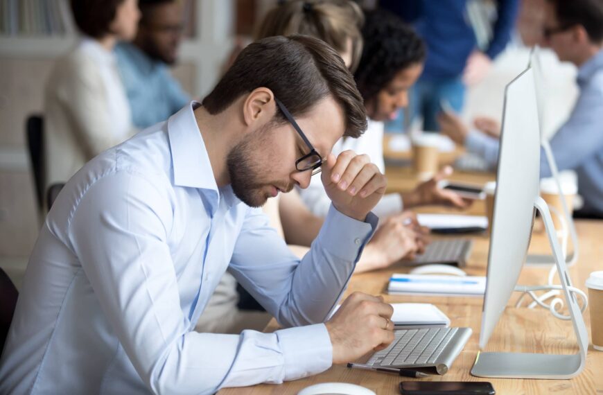 Businessman feels desperate having serious problem at work